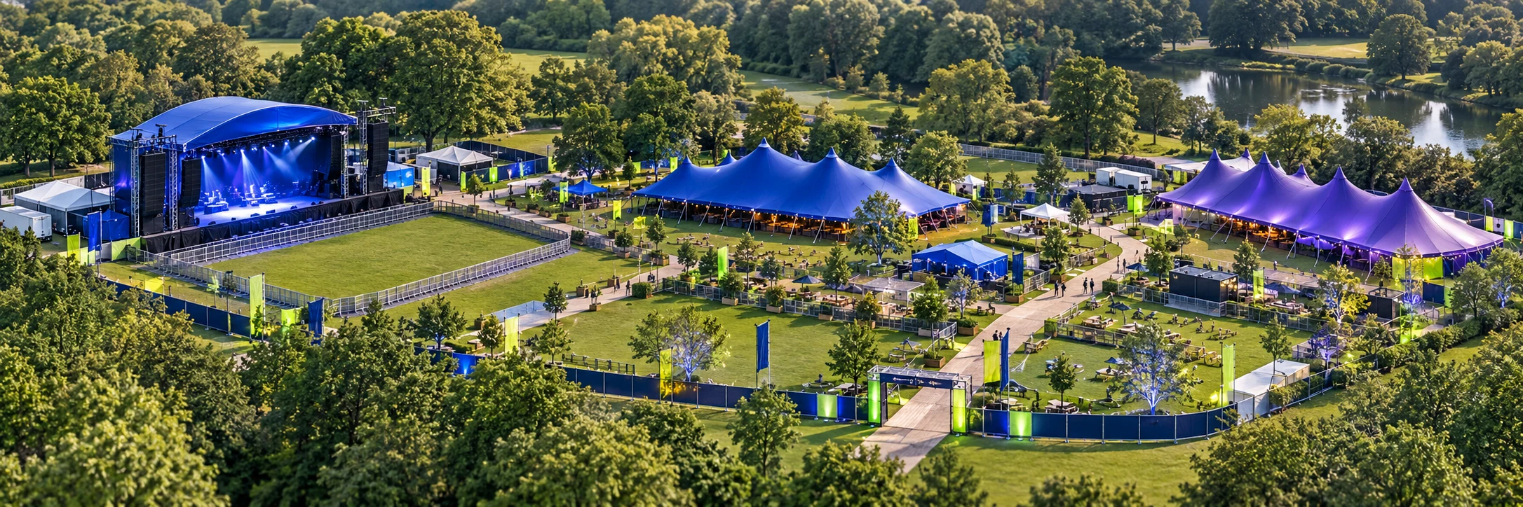 Illustrative festival site plan with a blue stage, marquees, fences and mapped event areas